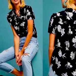 Anthropologie top with floral ruffle trim